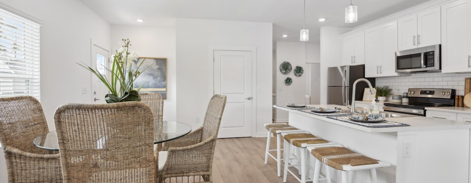 a kitchen with white cabinets