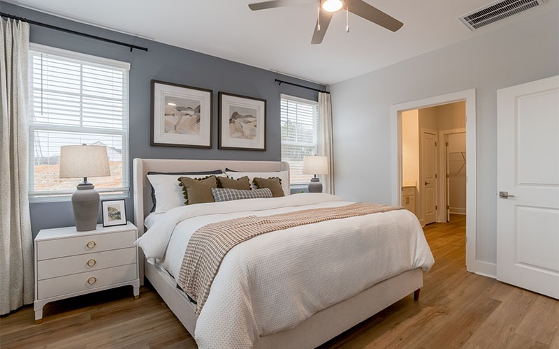 a bedroom with lots of natural light