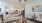 a living room with view of kitchen