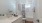 bathroom counter showing sinks and shower
