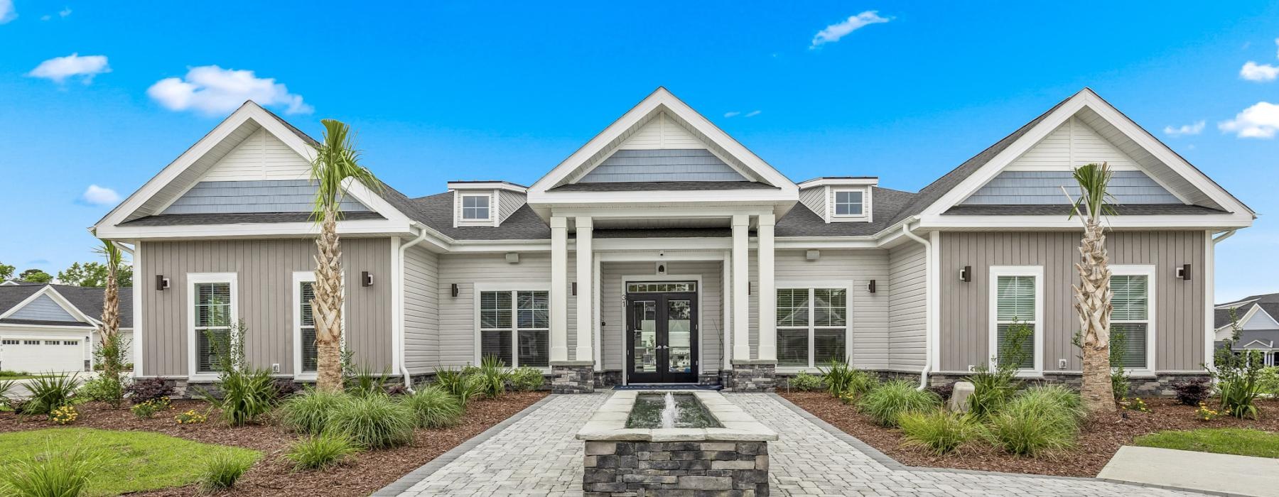 a house with a brick driveway